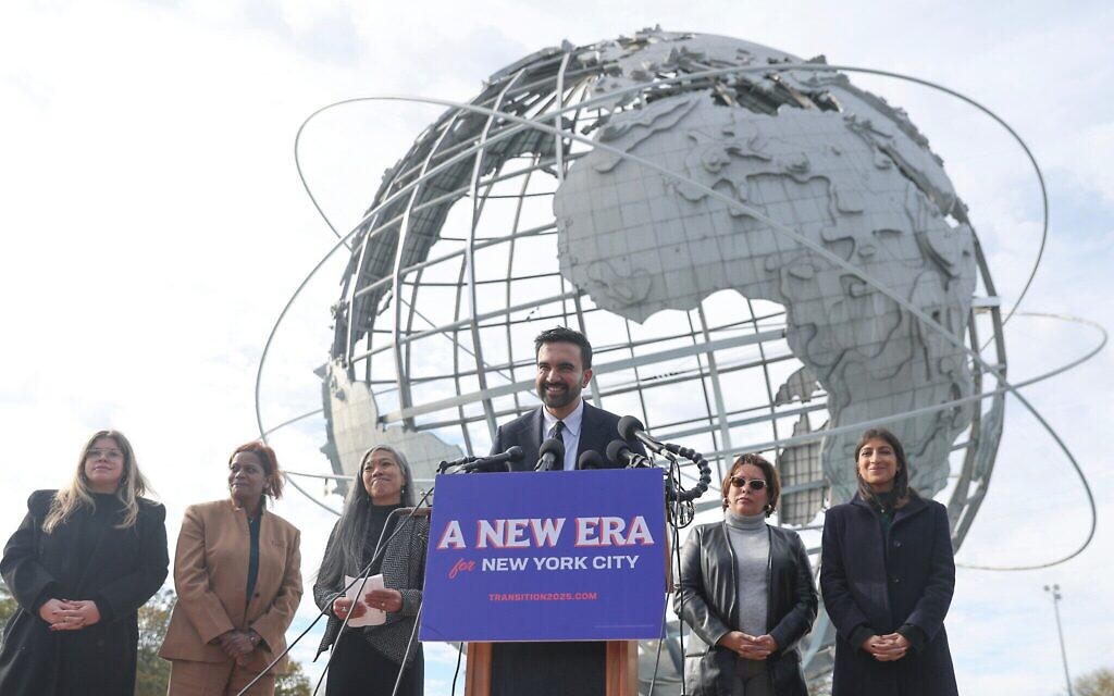 New York City Mayor-elect Zohran Mamdani, center, speaks in front of the Unisphere alongside his transition team, in Queens, New York City, November 5, 2025. (AP Photo/Heather Khalifa) New York City Mayor-elect Zohran Mamdani, center, speaks in front of the Unisphere alongside his transition team, in Queens, New York City, November 5, 2025. (AP Photo/Heather Khalifa)