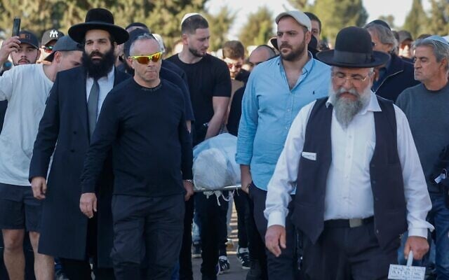 Friends and family attend the funeral of Dan Elkayam in Ashdod, December 25, 2025. Photo: Tal Gal/Flash90 Friends and family attend the funeral of Dan Elkayam in Ashdod, December 25, 2025. Photo: Tal Gal/Flash90