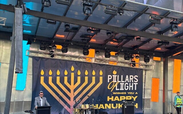 Rabb Gabi Katlmann addresses the crowd at Pillars of Light in Federation Square on December 16, 2025. Photo: Sharyn Kolieb Rabb Gabi Katlmann addresses the crowd at Pillars of Light in Federation Square on December 16, 2025. Photo: Sharyn Kolieb