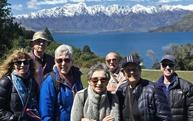 Walkers enjoy New Zealand’s spectacular scenery in Queenstown. Walkers enjoy New Zealand’s spectacular scenery in Queenstown.