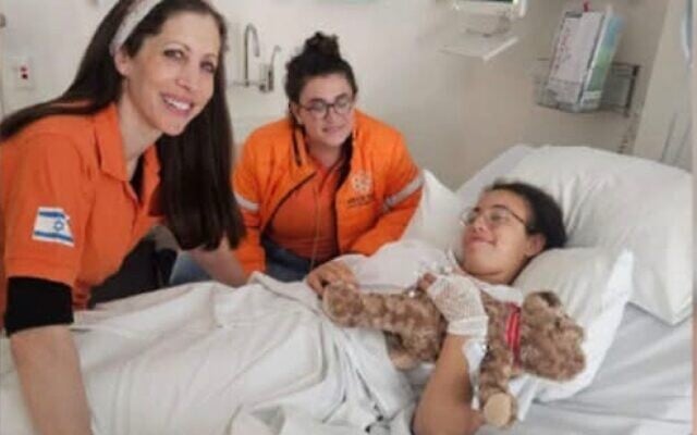 United Hatzalah in Sydney with a 14-year-old girl injured in the Bondi massacre. Photo: Facebook. United Hatzalah in Sydney with a 14-year-old girl injured in the Bondi massacre. Photo: Facebook.