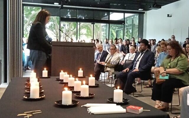 15 candles were lit at the memorial service at the University of Sydney on the National Day of Mourning. Photos: Shane Desiatnik 15 candles were lit at the memorial service at the University of Sydney on the National Day of Mourning. Photos: Shane Desiatnik