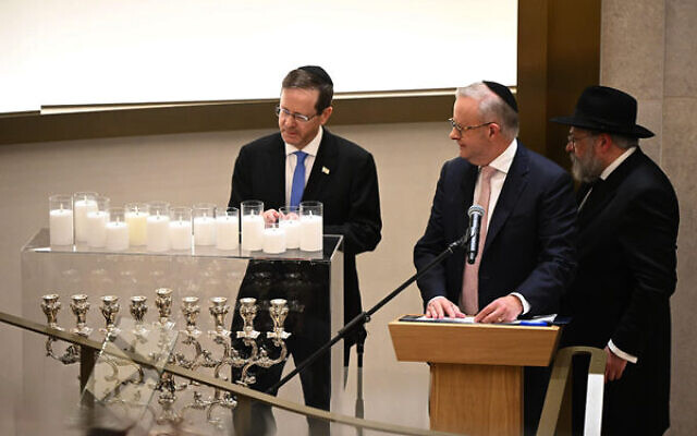 President Isaac Herzog, Prime Minister Anthony Albanese and Rabbi Yehoram Ulman at Chabad of Bondi. Photo: TOI via AP President Isaac Herzog, Prime Minister Anthony Albanese and Rabbi Yehoram Ulman at Chabad of Bondi. Photo: TOI via AP