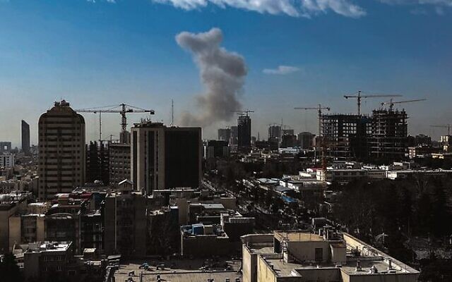 A plume of smoke rises following a reported explosion in Tehran on
February 28. Photo: AFP A plume of smoke rises following a reported explosion in Tehran on
February 28. Photo: AFP