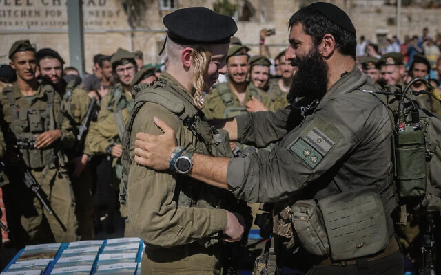 Soldiers from the Netzach Yisrael Brigade take part in a ceremony at the Western Wall. Photo: Chaim Goldberg/Flash90/Times of Israel Soldiers from the Netzach Yisrael Brigade take part in a ceremony at the Western Wall. Photo: Chaim Goldberg/Flash90/Times of Israel