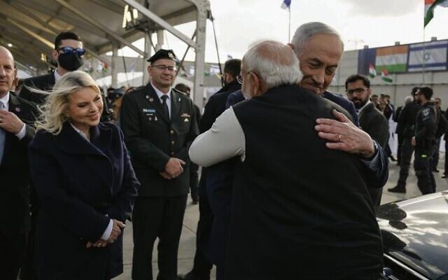 Israeli Prime Minister Benjamin Netanyahu says farewell to his Indian counterpart Narendra Modi at Ben Gurion Airport as wife Sara looks on. Photo: Roi Avraham/GPO Israeli Prime Minister Benjamin Netanyahu says farewell to his Indian counterpart Narendra Modi at Ben Gurion Airport as wife Sara looks on. Photo: Roi Avraham/GPO