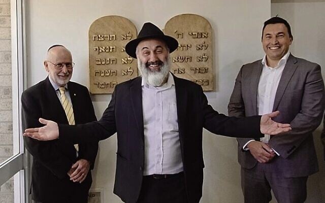 From left: Michael Morris, Rabbi Roni Cohavi, and Joshua Lewis in front of the restored 10 Commandments tablets. Photo: Vinay Mann From left: Michael Morris, Rabbi Roni Cohavi, and Joshua Lewis in front of the restored 10 Commandments tablets. Photo: Vinay Mann