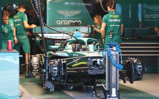 Engineers work on Lance Stroll's car in the Aston Martin garage. Photo: Peter Haskin Photography Engineers work on Lance Stroll's car in the Aston Martin garage. Photo: Peter Haskin Photography