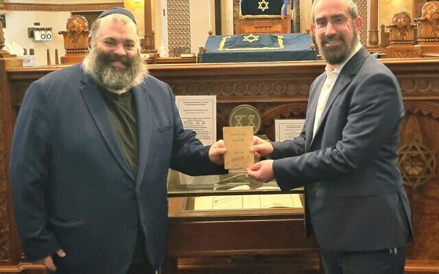 Ahron Adelist with Rabbi Glasman in front of the VAJEX Book of Remembrance. Photos: Rabbi Yaakov Glasman. Ahron Adelist with Rabbi Glasman in front of the VAJEX Book of Remembrance. Photos: Rabbi Yaakov Glasman.