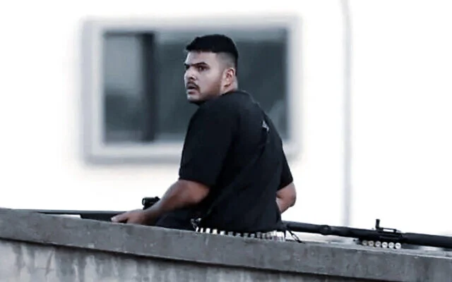 Gunman Naveed Akram in the course of a deadly terror attack on a Hanukkah event at Bondi Beach, Sydney, Australia, December 15, 2025. (Screengrab used in accordance with clause 27a of the copyright law) Gunman Naveed Akram in the course of a deadly terror attack on a Hanukkah event at Bondi Beach, Sydney, Australia, December 15, 2025. (Screengrab used in accordance with clause 27a of the copyright law)