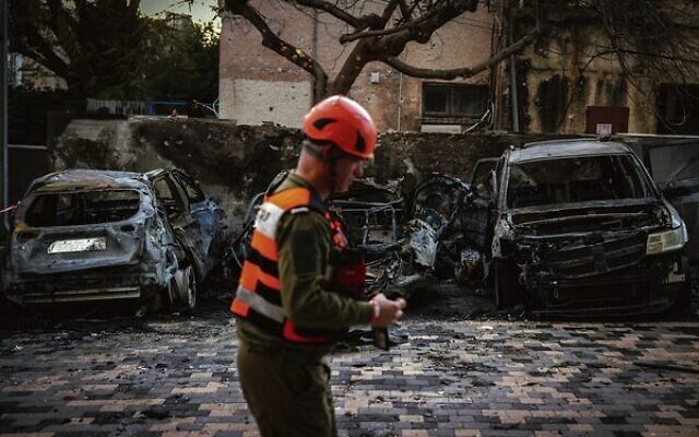 The scene after a rocket fired from Lebanon struck the northern city of Nahariya on
March 26. Photo: David Cohen/Flash90 The scene after a rocket fired from Lebanon struck the northern city of Nahariya on
March 26. Photo: David Cohen/Flash90