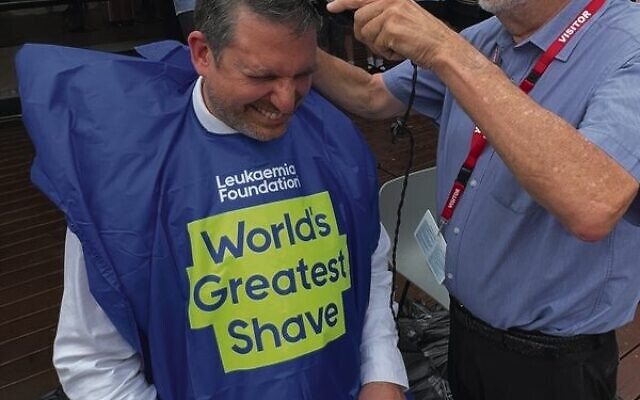 Fred Bergman shaving Principal Dan Sztrajt's hair.
Photo: Mount Scopus Memorial College Fred Bergman shaving Principal Dan Sztrajt's hair.
Photo: Mount Scopus Memorial College