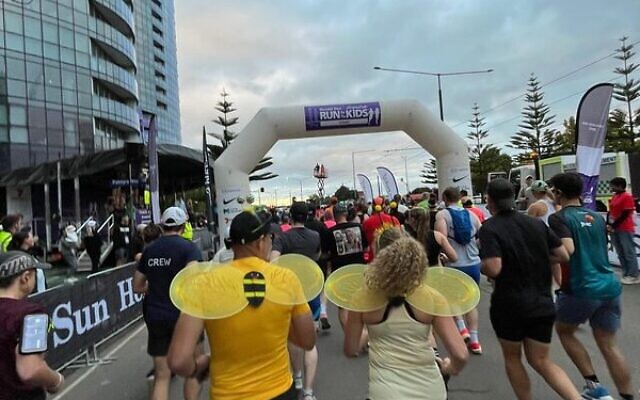 Some of the runners wearing their bee wings. Photo: Supplied. Some of the runners wearing their bee wings. Photo: Supplied.