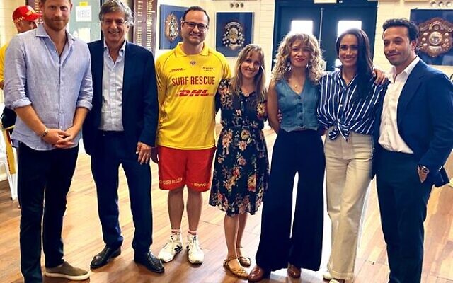 From left: Prince Harry, Greg Shand, Jacob Ezrakhovich, Shannon Biederman, Jessica Chapnik Kahn, Meghan Markle, Elon Zizer. Photo: Geoff Sirmai From left: Prince Harry, Greg Shand, Jacob Ezrakhovich, Shannon Biederman, Jessica Chapnik Kahn, Meghan Markle, Elon Zizer. Photo: Geoff Sirmai