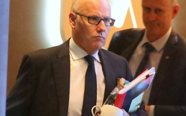 John Lyons leaving the ABC office. Photo: AAP Photos. John Lyons leaving the ABC office. Photo: AAP Photos.