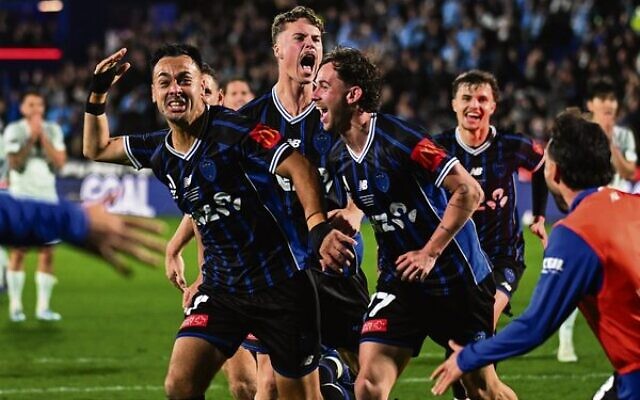 Jake Girdwood-Reich (second from left) celebrates with teammates after Cam Howieson (left) scored for Auckland FC in their 1-0 A-League Men's grand final win over Sydney FC at Go Media Stadium on May 23.
Photo: AAP Image/
Photosport/Andrew Cornaga Jake Girdwood-Reich (second from left) celebrates with teammates after Cam Howieson (left) scored for Auckland FC in their 1-0 A-League Men's grand final win over Sydney FC at Go Media Stadium on May 23.
Photo: AAP Image/
Photosport/Andrew Cornaga