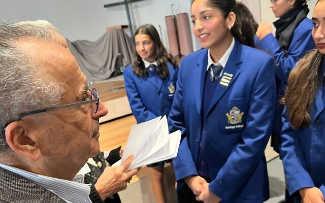 Holocaust survivor Peter Gasper, speaking to Heritage College students after the memorial. Photo: Bruce Hill. Holocaust survivor Peter Gasper, speaking to Heritage College students after the memorial. Photo: Bruce Hill.