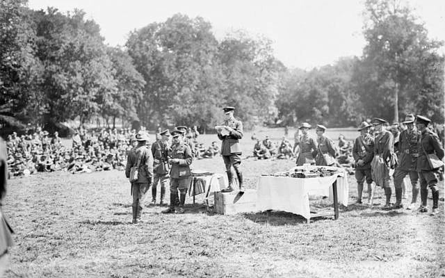 Lieutenant General Sir John Monash presenting decorations to members of the 4th Australian Infantry Brigade, after their success in the Battle of Hamel. Photo: (Public domain, via Wikimedia Commons), Times of Israel. Lieutenant General Sir John Monash presenting decorations to members of the 4th Australian Infantry Brigade, after their success in the Battle of Hamel. Photo: (Public domain, via Wikimedia Commons), Times of Israel.