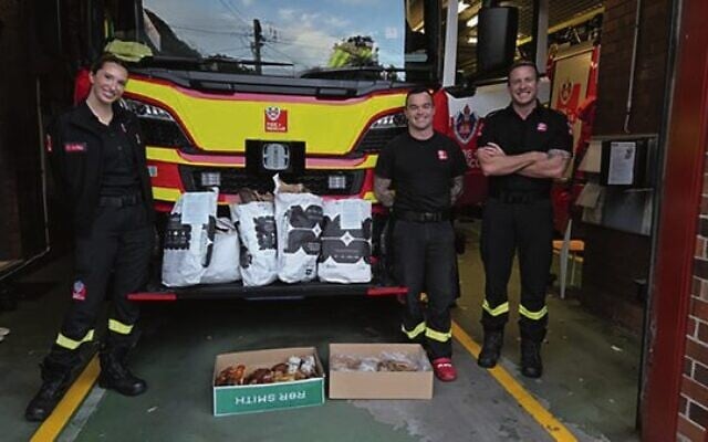 Kindness Collective delivering food to fire rescue teams in Sydney.
Photos: Supplied Kindness Collective delivering food to fire rescue teams in Sydney.
Photos: Supplied
