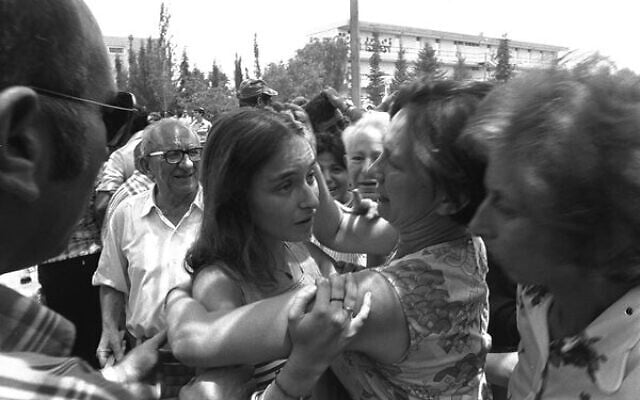 An emotional family reunion upon the return to Israel of the hostages from the Air France flight hijacked to Entebbe, Uganda, July 4, 1976.
Photo: Israel Government Press Office An emotional family reunion upon the return to Israel of the hostages from the Air France flight hijacked to Entebbe, Uganda, July 4, 1976.
Photo: Israel Government Press Office