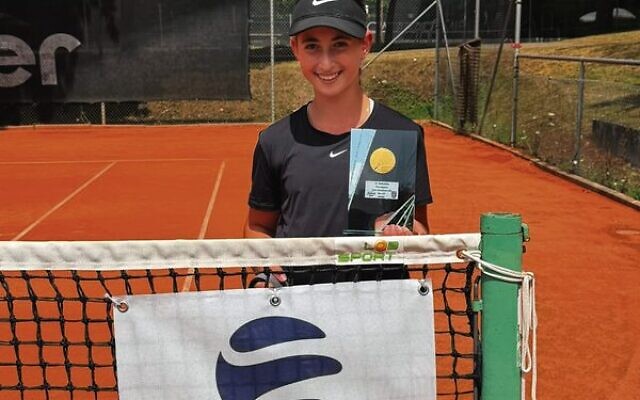 Darcy Basist holding her singles trophy in Waiblingen, Germany. Darcy Basist holding her singles trophy in Waiblingen, Germany.