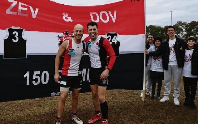 AJAX premier thirds captain Zev Aron (left) and teammate Dov Paltiel in front of their 150th game celebratory banner last Sunday at Gary Smorgon Oval. Photos: Peter Haskin AJAX premier thirds captain Zev Aron (left) and teammate Dov Paltiel in front of their 150th game celebratory banner last Sunday at Gary Smorgon Oval. Photos: Peter Haskin