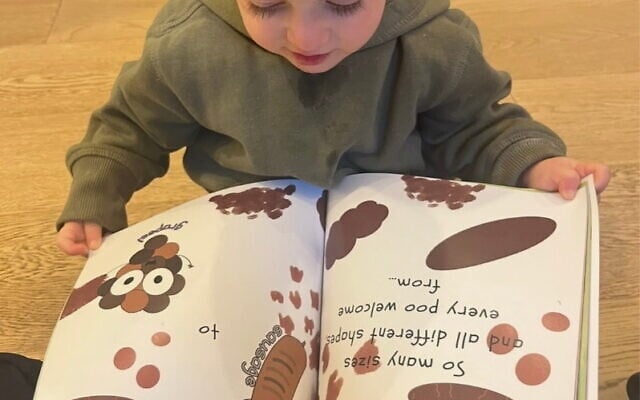 Carla's son Sunny reading Poo Party. Photo: supplied Carla's son Sunny reading Poo Party. Photo: supplied