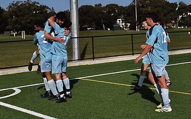 Maccabi's men's division 2 team celebrates after the winning goal was scored in their major semi-final win last Saturday. Maccabi's men's division 2 team celebrates after the winning goal was scored in their major semi-final win last Saturday.