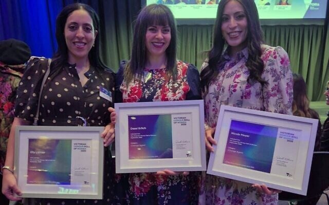 The three sisters receiving their honour on Wednesday night. Photo: supplied The three sisters receiving their honour on Wednesday night. Photo: supplied