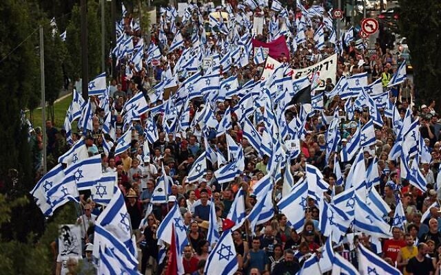 Demonstrators march to protest the government's judicial overhaul plans in July, 2023. Photo: Ronaldo Schemidt/AFP Demonstrators march to protest the government's judicial overhaul plans in July, 2023. Photo: Ronaldo Schemidt/AFP