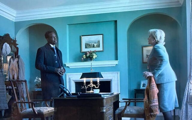 Frances Munning, played by Penny Downie in The Diplomat, in a tribute scene to the late Hersh Goldberg-Polin in season four, tells an anecdote to Stuart Heyford, played by Ato Essandoh Photo: Screenshot Frances Munning, played by Penny Downie in The Diplomat, in a tribute scene to the late Hersh Goldberg-Polin in season four, tells an anecdote to Stuart Heyford, played by Ato Essandoh Photo: Screenshot