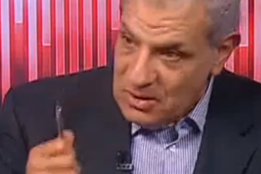 ابراهيم محلب في آخر ظهور له على شاشة التلفزيون المصري قبل تكليفه بتشكيل الحكومة (من شاشة اليوتوب OnTv livestreaming)