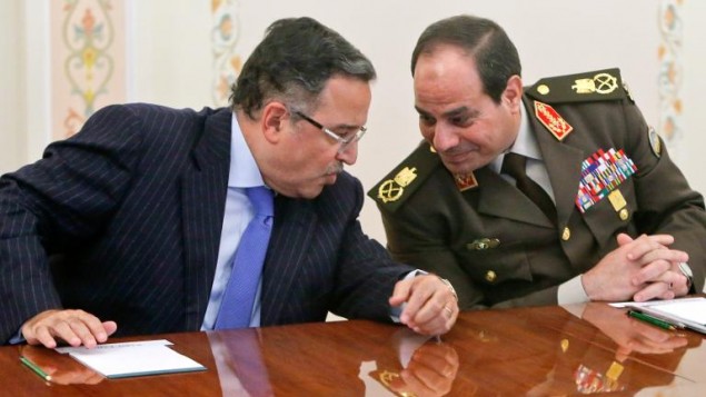 المشير عبد الفتاح السيسي ووزير الخارجية نبيل فهمي خلال اجتماعها بالرئيس بوتين في موسكو في 13 شباط/فبراير 2014 
© ا ف ب ماكسيم شيميتوف
