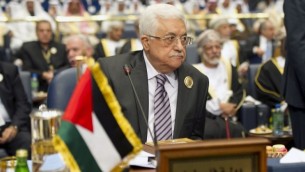 القائد الفلسطيني محمود عباس اثناء القمة الخامسة والعشرون للجامعة العربية 25 مارس 2014 (بعدسة ياسر الزيات/ أ ف ب)