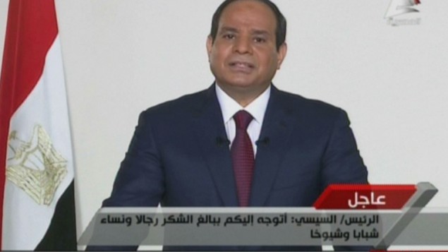 صورة مأخوذة من التلفزيون المصري يظهر قائد الجيش السابق والرئيس المصري المنتخب حديثا عبد الفتاح السيسي الناطقة في خطاب متلفز إلى أمته على 3 يونيو 2014 بعد أن أعلنت اللجنة الانتخابية فوزه 96.9 في المئة من الأصوات  "AFP PHOTO / EGYPTIAN TV"