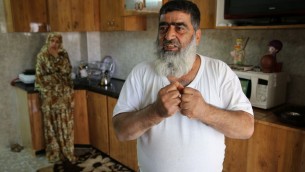 عمر ابو عيشة في بيته بالخليل ( Courtesy)