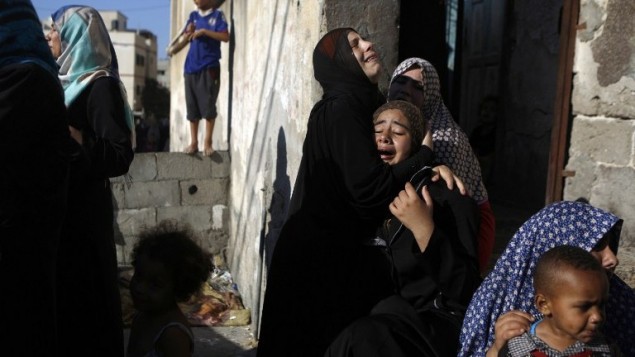 تشييع جنازة أربعة أولاد، وجميعهم من عائلة بكر، في مدينة غزة، في 16 يوليو 2014. وقتل أربعة أطفال قتلوا وجرح عدة في الشاطئ في مدينة غزة وقد تكون الضربات نتيجة لقصف من قبل البحرية الإسرائيلية AFP PHOTO / MOHAMMED ABED تشييع جنازة أربعة أولاد، وجميعهم من عائلة بكر، في مدينة غزة، في 16 يوليو 2014. وقتل أربعة أطفال قتلوا وجرح عدة في الشاطئ في مدينة غزة وقد تكون الضربات نتيجة لقصف من قبل البحرية الإسرائيلية AFP PHOTO / MOHAMMED ABED