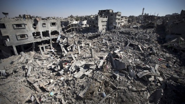 26 يوليو 2014  أنقاض المباني والمنازل في منطقة الشجاعية في  مدينة غزة واتي دمرت كليا AFP PHOTO / MAHMUD HAMS