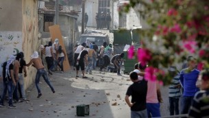 اشتباكات مع الشرطة خلال  مظاهرة في حي وادي الجوز في القدس الشرقية  7 سبتمبر 2014.  AFP/Ahmad Gharabli