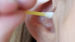 A woman cleaning her ear with a cotton bud.
May 01, 2011. Photo by Sophie Gordon / Flash 90