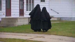 Lev Tahor girls walking in Chatham, Ontario, in December 2013 (screen capture: YouTube)