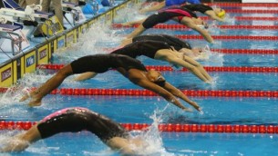 12th FINA World Swimming Championships in Doha, December 6, 2014 (photo credit: AFP PHOTO/Marwan Naamani)
