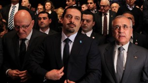 رئيس الوزراء اللبناني السابق سعد الحريري مع رئيس الوزراء اللبناني تمام سلام والرئيس اللبناني السابق ميشال سليمان، في حفل لاحياء الذكرى العاشرة لاغتيال رفيق الحريري 14 فبراير 2015 (ANWAR AMRO / AFP)