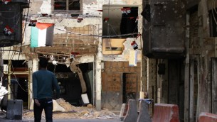 مخيم اليرموك للاجئين الفلسطينيين، 23 يونيو 2014 (LOUAI BESHARA / AFP)