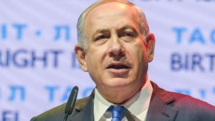 بينيامين نتنياهو خلال مشاركته في حدث أُجري في مركز المؤتمرات الدولي في القدس، 12 يناير، 2016. (Amos Ben Gershom/GPO)