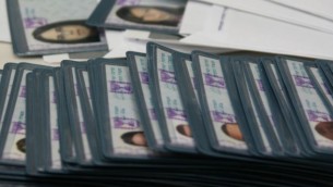 مجموعة بطاقات هوية إسرائيلية، 22 يناير، 2008. (Anna Kaplan/ Flash90)