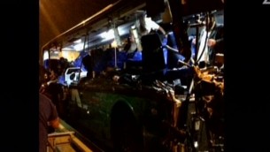 A bus involved in a fatal accident on Route 1 (screen capture: Channel 2)