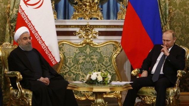 الرئيس الإيراني حسن روحاني يلتقي بنظيره الروسي فلاديمير بوتين في الكرملين، 28 مارس 2017 (Sergei Karpukhin/AFP) الرئيس الإيراني حسن روحاني يلتقي بنظيره الروسي فلاديمير بوتين في الكرملين، 28 مارس 2017 (Sergei Karpukhin/AFP)