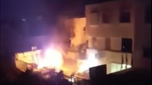 اشعال مركبات شرطة في كفر قاسم، 6 يونيو 2017 (screen capture: YouTube)
