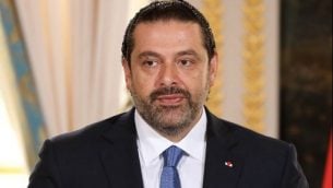 رئيس الوزراء اللبناني سعد الحريري يتحدث في مؤتمر صحفي مشترك مع الرئيس الفرنس إيمانويل ماكرون (لا يظهر في الصورة) في قصر الإليزيه في باريس، 1 سبتمبر، 2017. (AFP Photo/Ludovic Marin)